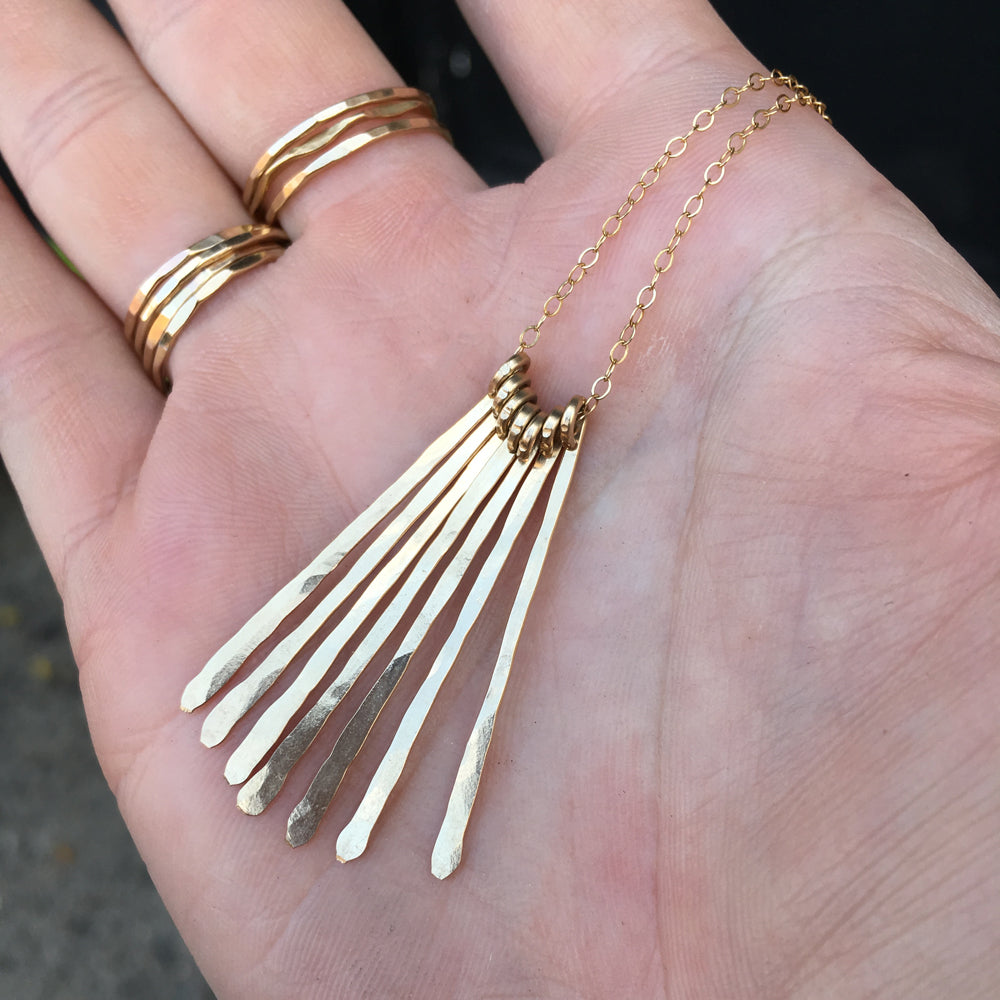 Are you wearing your necklace backwards? Yes, there is a "right" way to wear your DLJ.