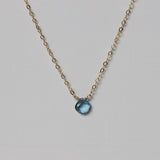london blue topaz and gold chain pendant