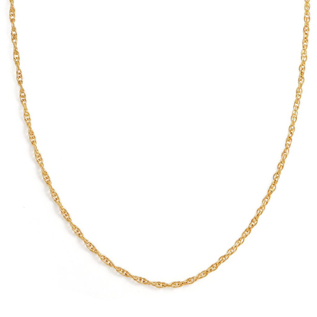 gold rope chain necklace on white background