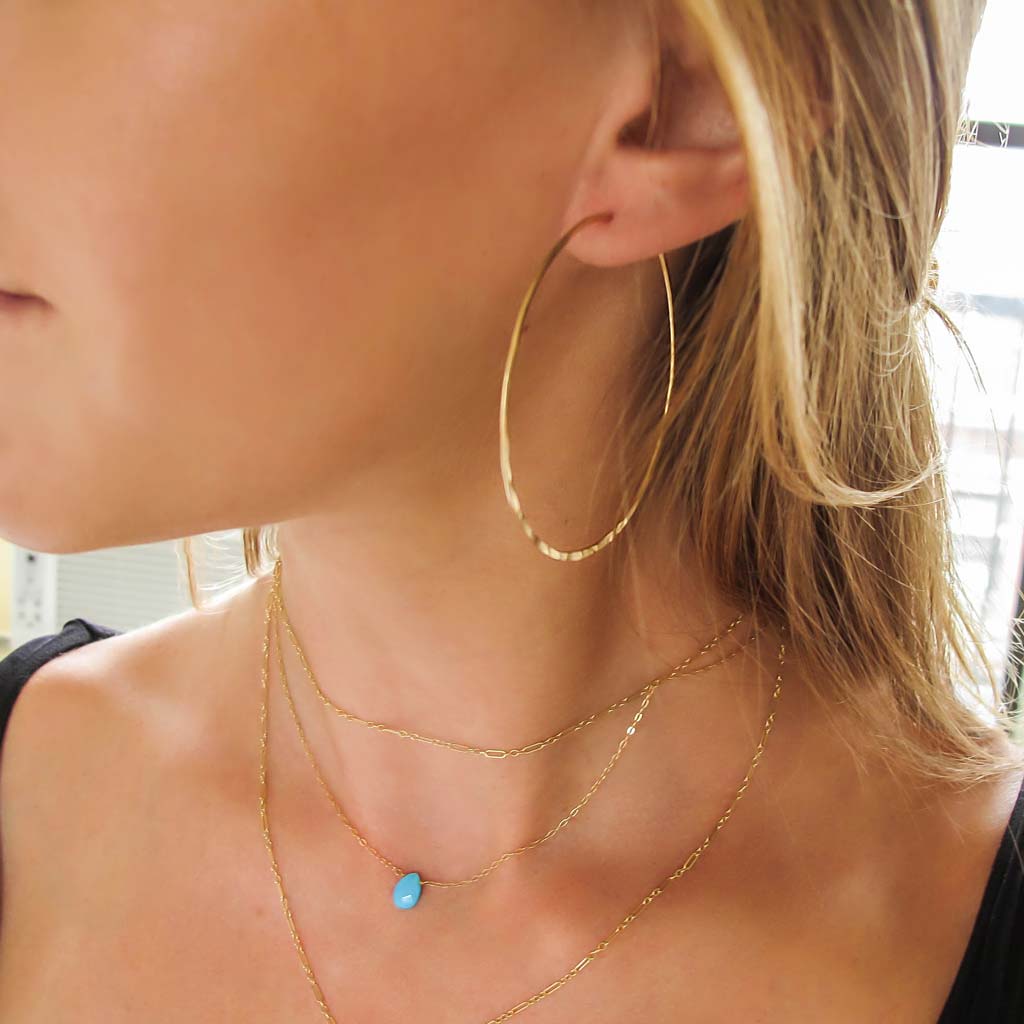 hammered gold hoop earrings by delia langan jewelry