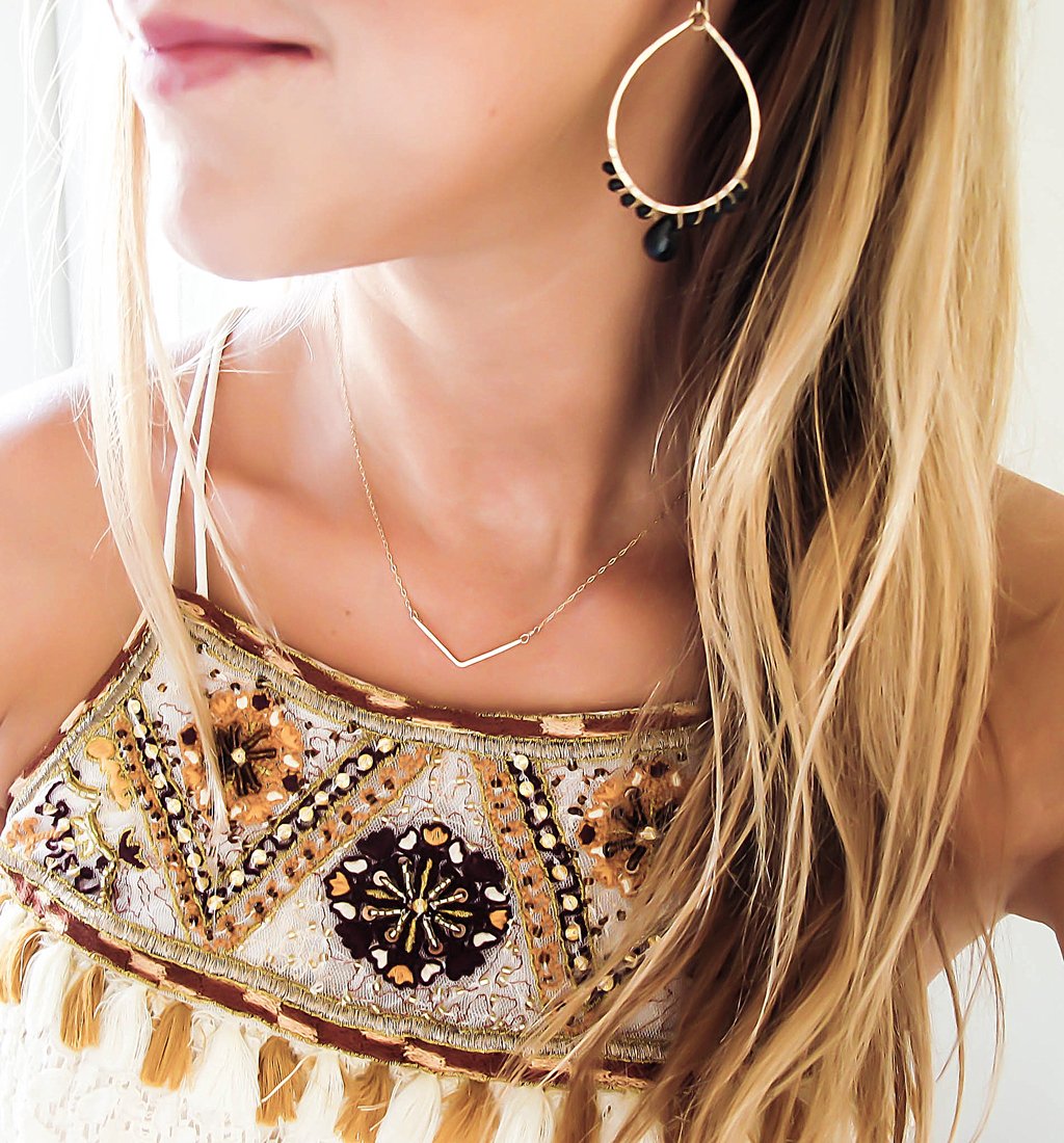 black spinel and gold earrings by delia langan jewelry