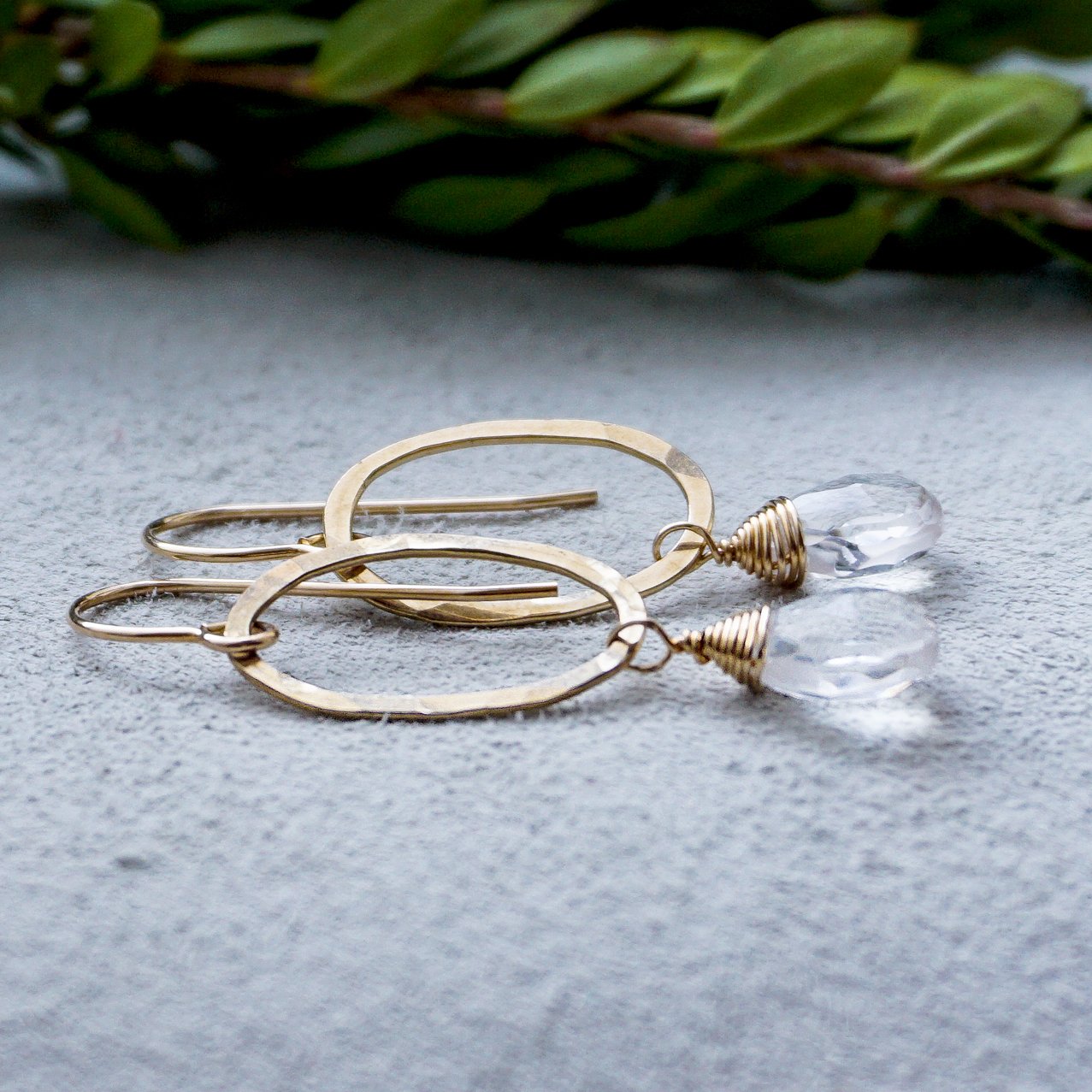 crystal quartz and gold oval small drop earrings by delia langan jewelry