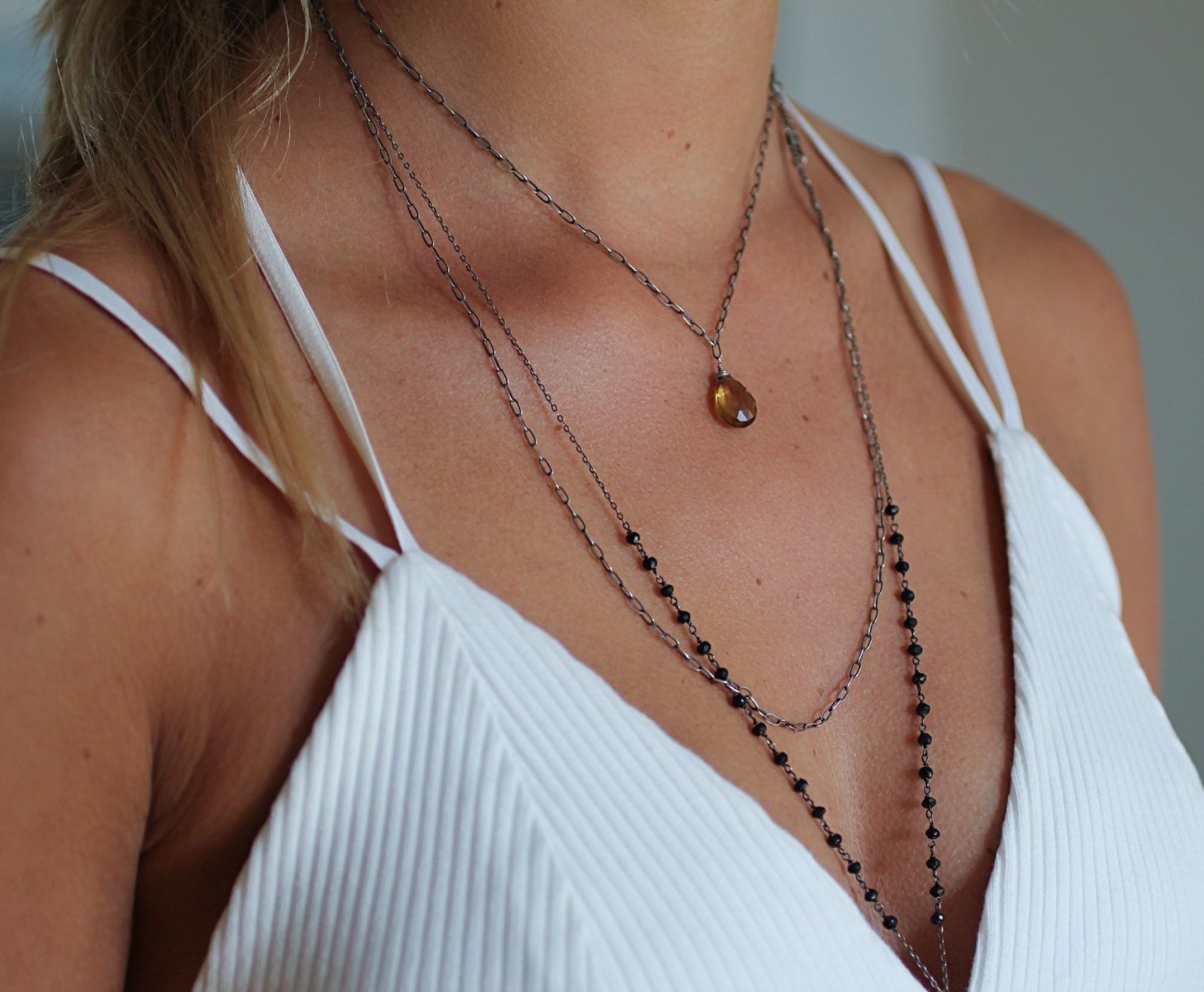 layered delicate oxidized necklaces beaded with beer quartz and black spinel