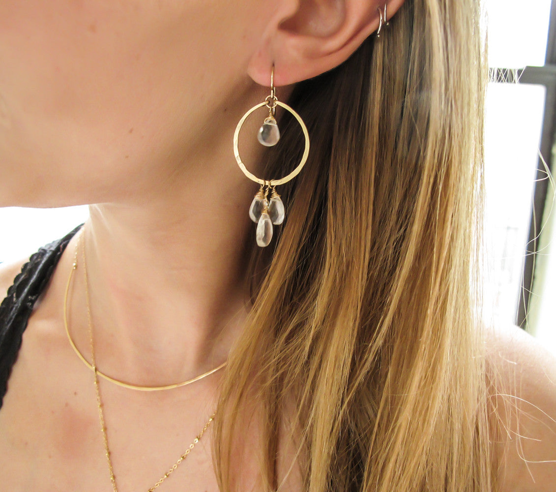 blond woman wearing 14k gold filled crystal quartz dreamcatcher gemstone hoops