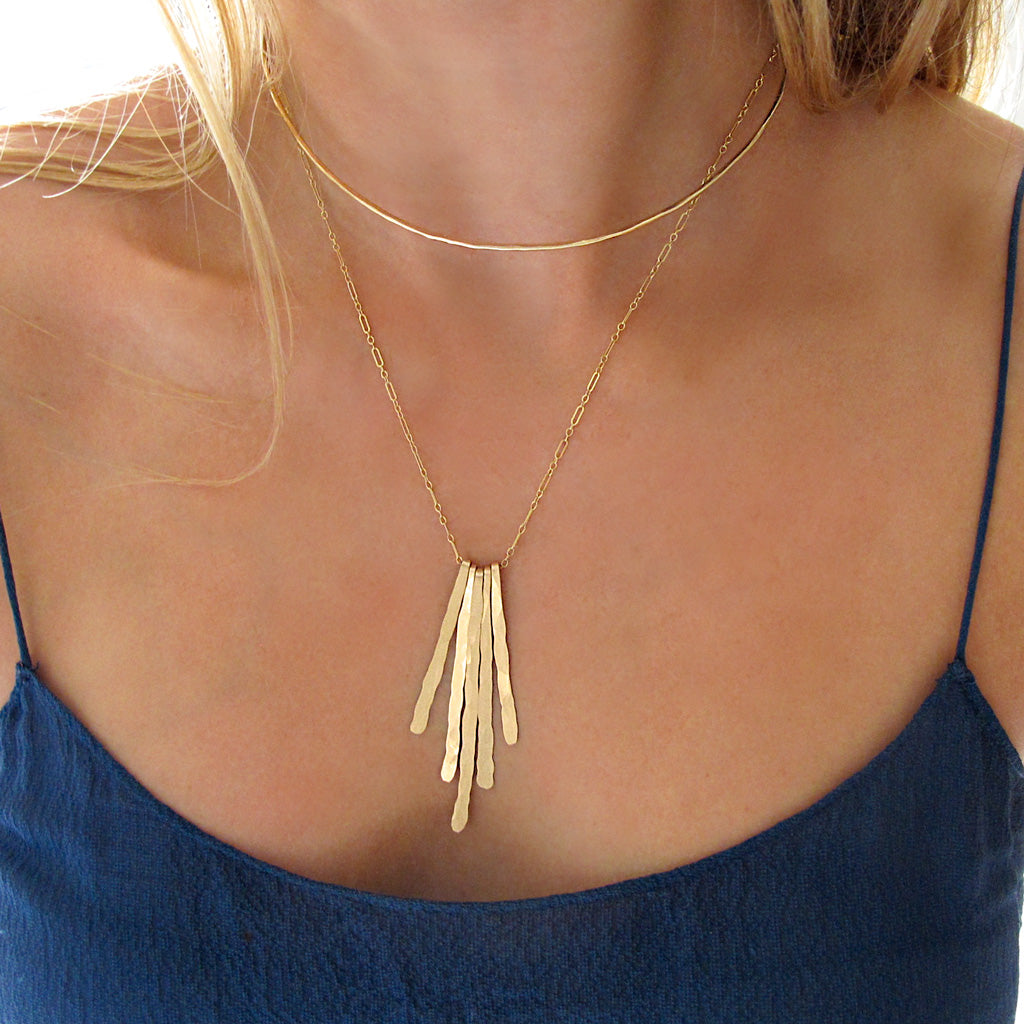 rays pendant gold fringe necklace and gold choker layering necklaces by delia langan jewelry