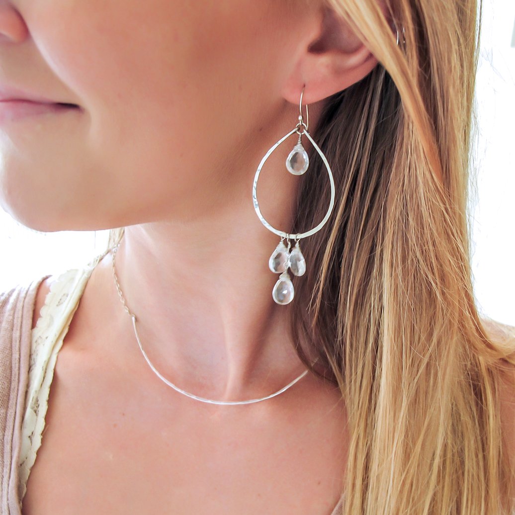 blond woman wearing sterling silver crystal quartz dreamcatcher teardrop gemstone hoops