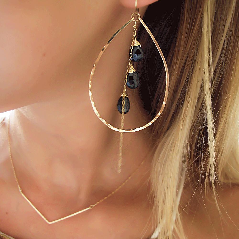 black spinel and gold earrings by delia langan jewelry