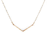 dainty gold wide v necklace by delia langan jewelry