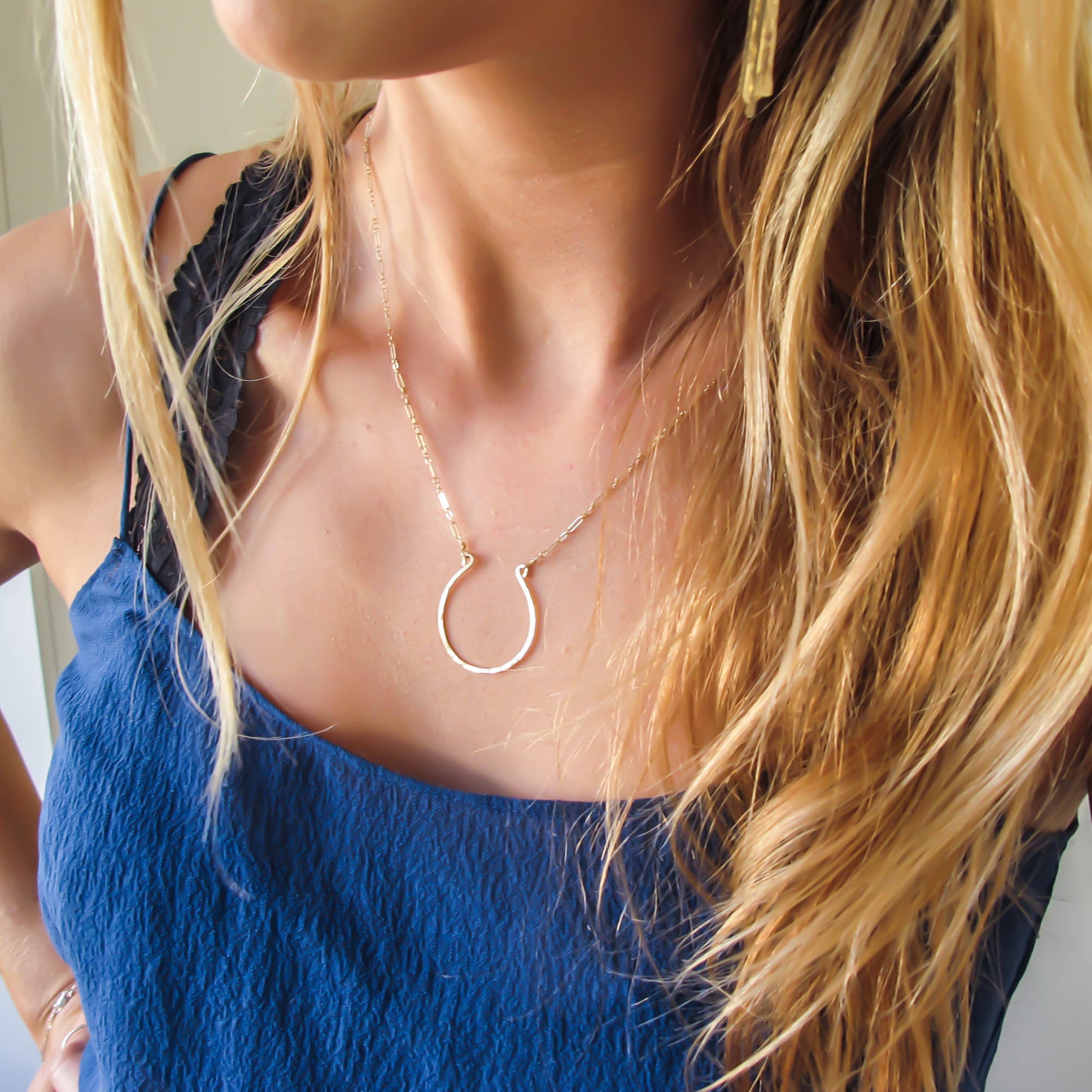 large horseshoe necklace by delia langan jewelry