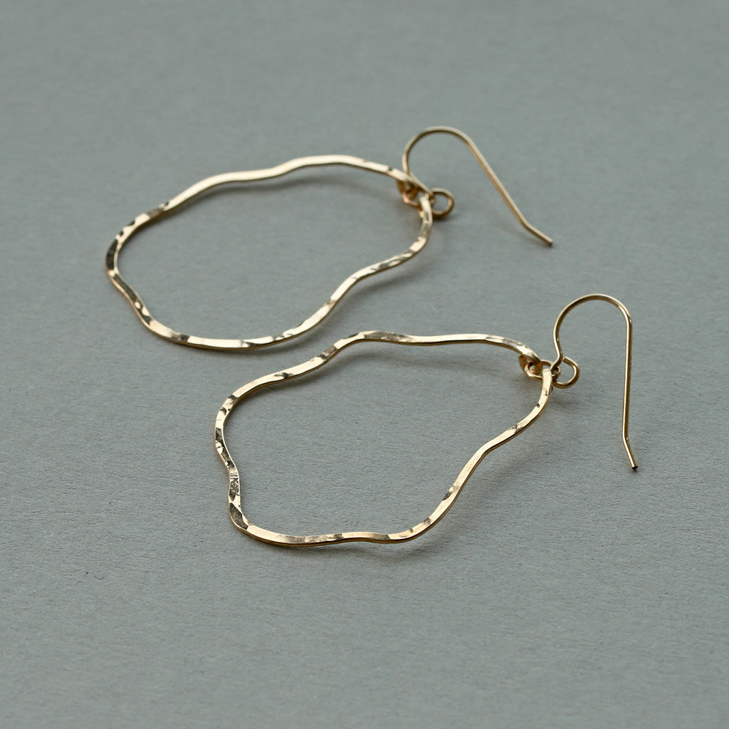 wavy thin hammered organic shaped gold hoop earrings