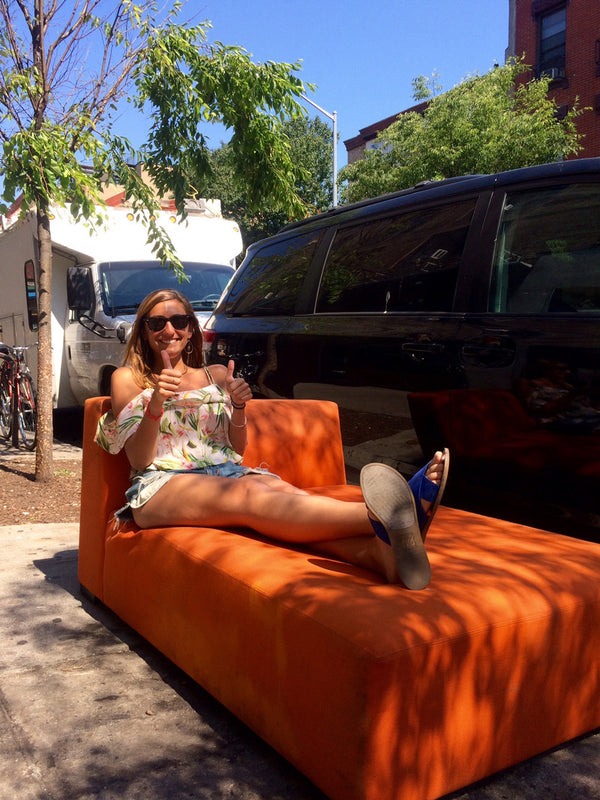 Girl on Orange Couch