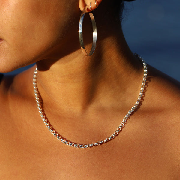 neckline with chunky silver rolo chain