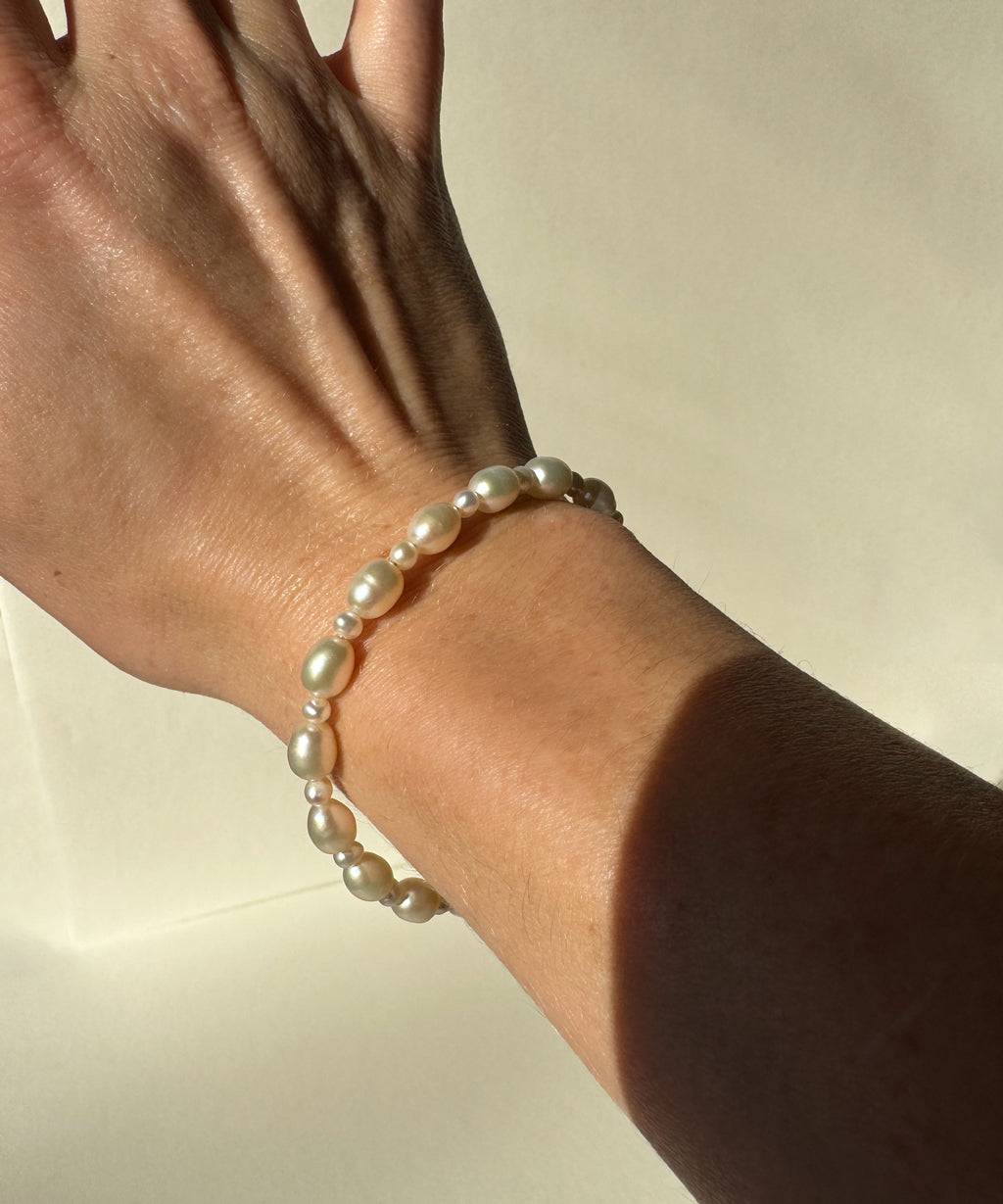pearl bracelet on wrist