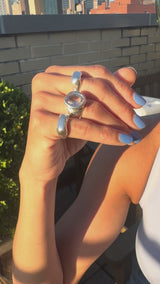 video of girl with chunky silver and pink amethyst rings