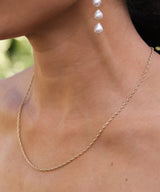 closeup of 14k gold filled rope chain necklace on girls neck