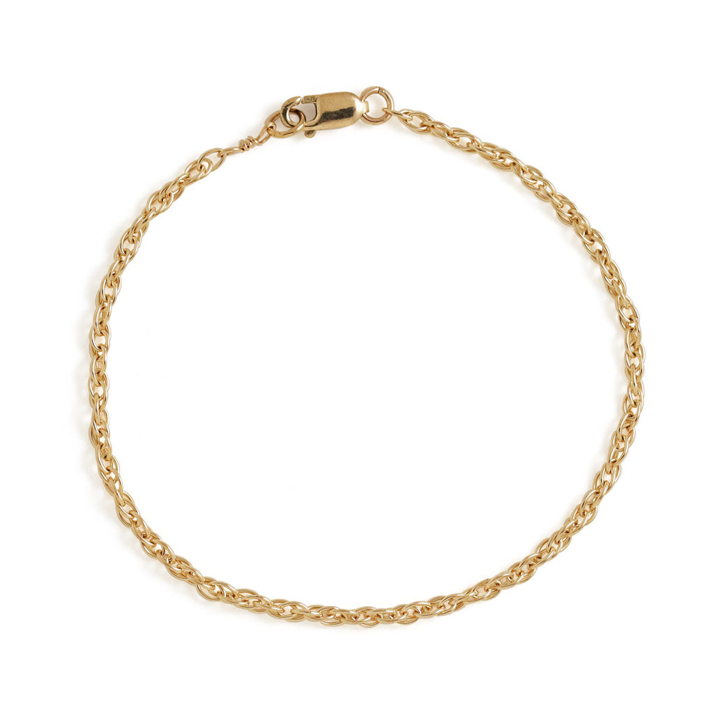 gold rope chain bracelet with lobster claw clasp on white background