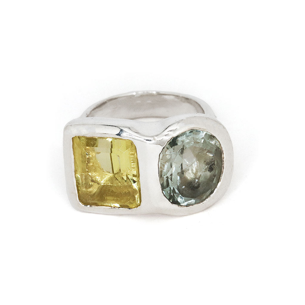 chunky yellow lemon quartz and green amethyst toi et moi silver ring on white background