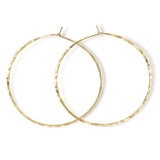 14k gold filled 2.5 inch endless thin hoop earrings on white surface