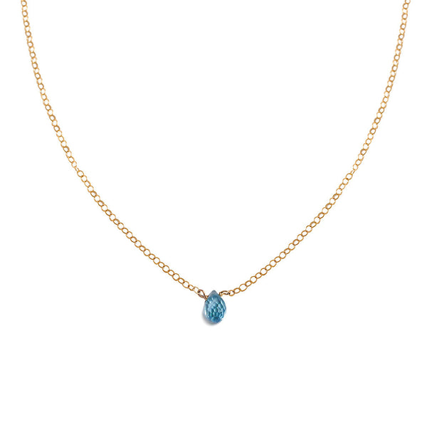 delicate blue topaz necklace on gold chain