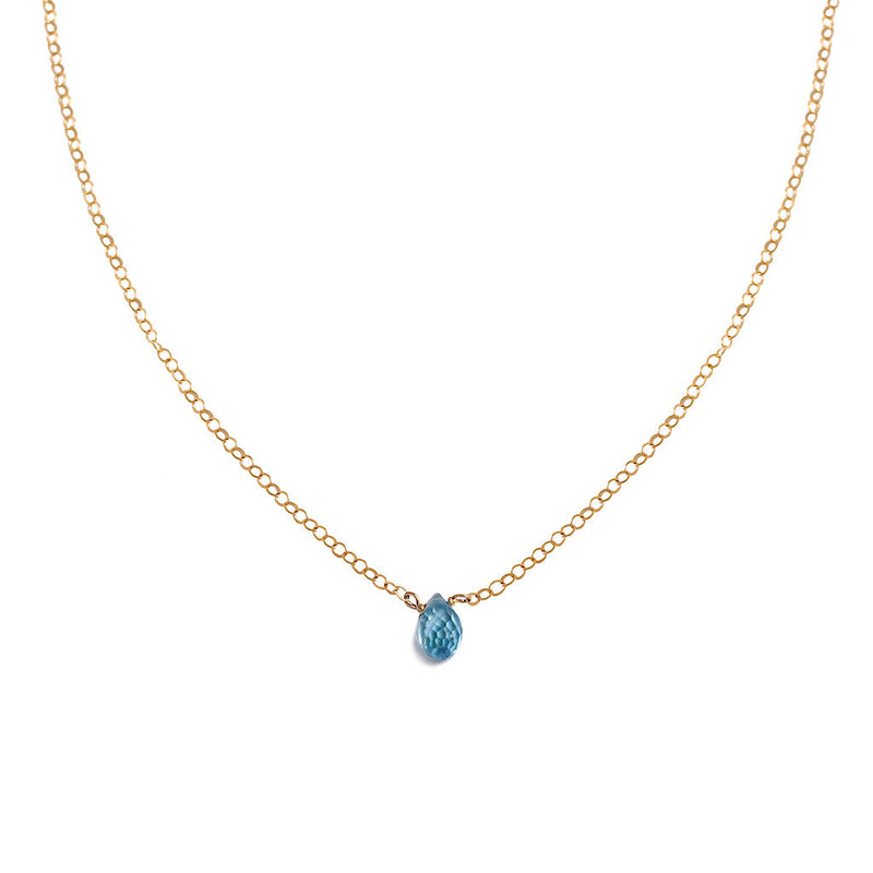 delicate blue topaz necklace on gold chain