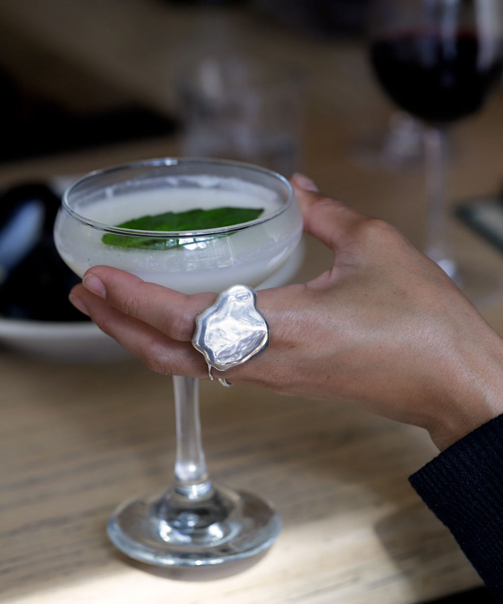 extra large cloud shaped silver ring holding cocktail
