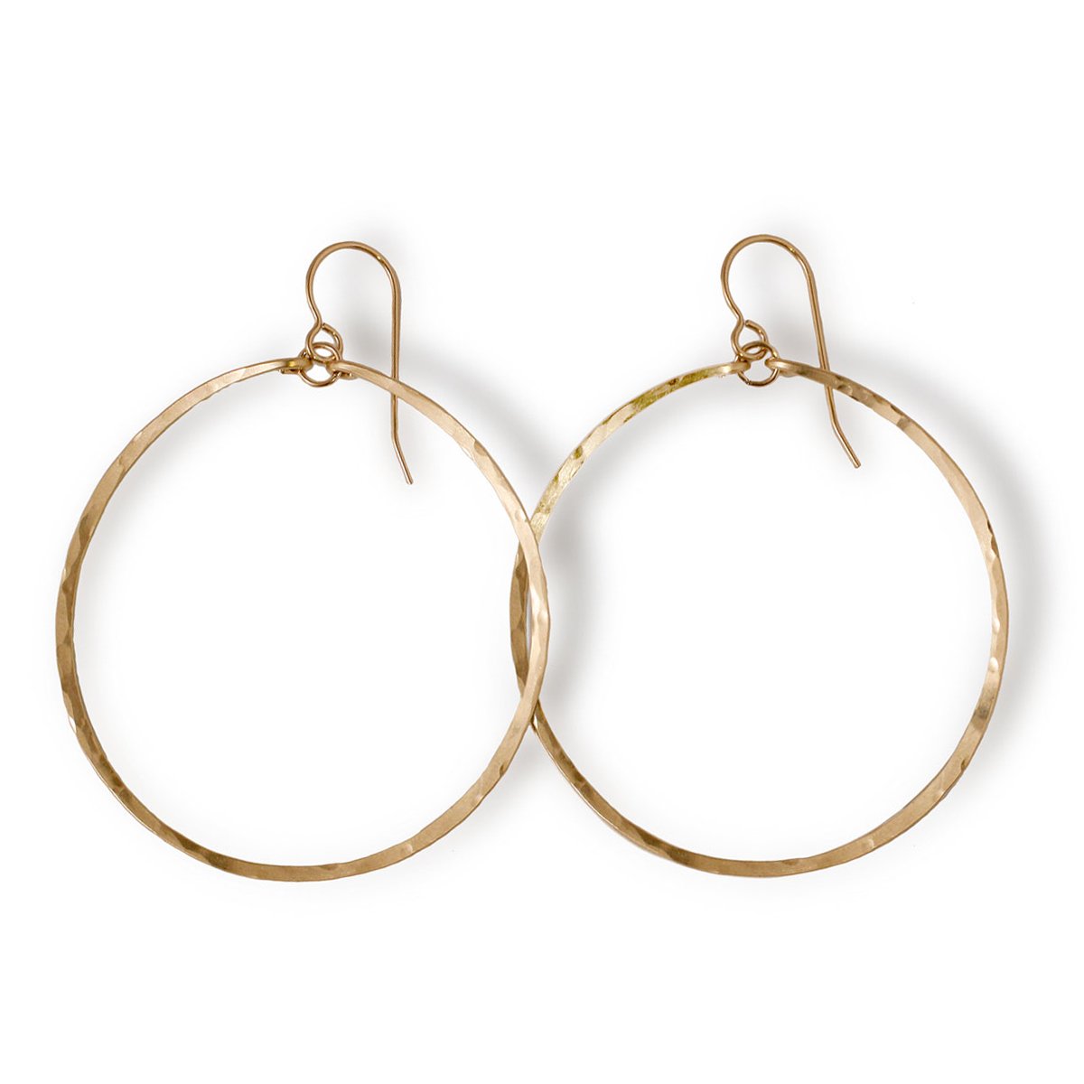 14k gold filled large round hoop earrings on a white surface 