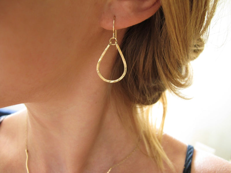 small tiny gold teardrop drop earrings by delia langan jewelry