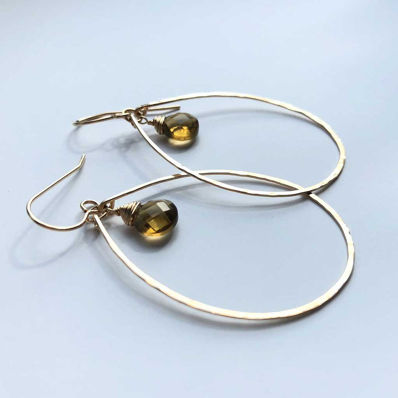 14k gold filled beer quartz teardrop gemstone earrings on gray surface