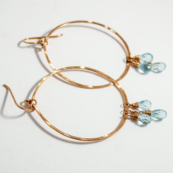 blue topaz and 14k gold filled hammered hoop earrings by delia langan jewelry