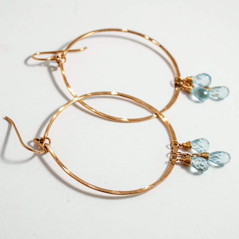 blue topaz and 14k gold filled hammered hoop earrings by delia langan jewelry