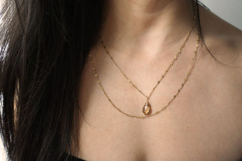 brunette neck closeup wearing 14k gold filled champagne quartz choker wrap gemstone necklace