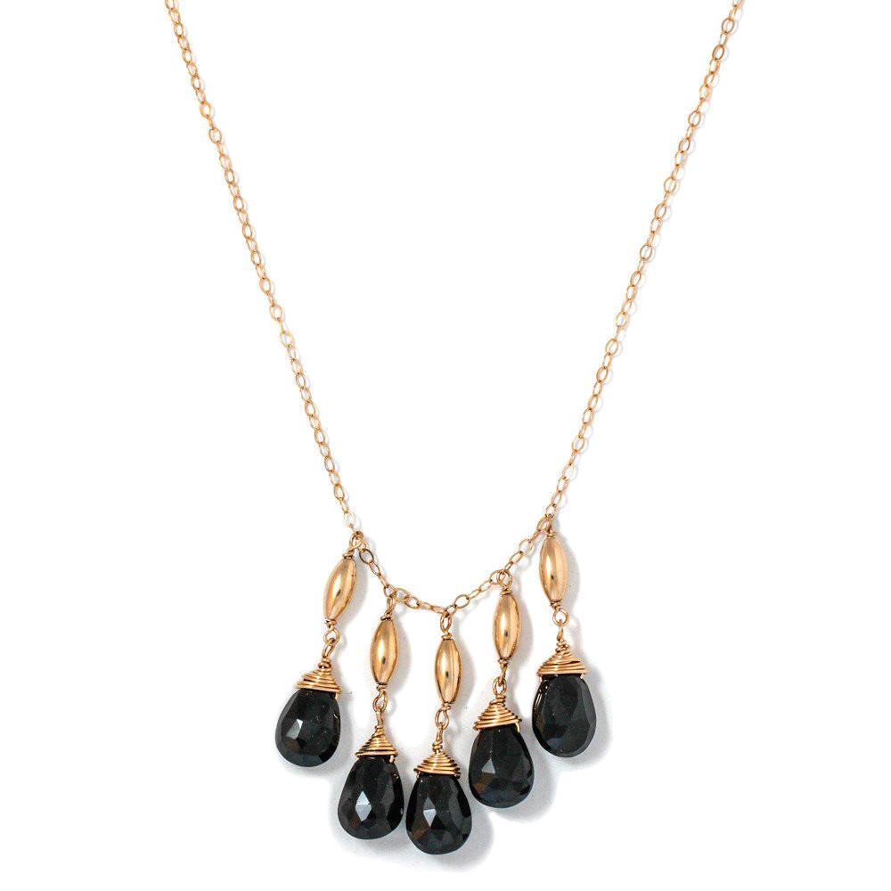 14k gold filled black spinel cascade gemstone necklace on white surface 