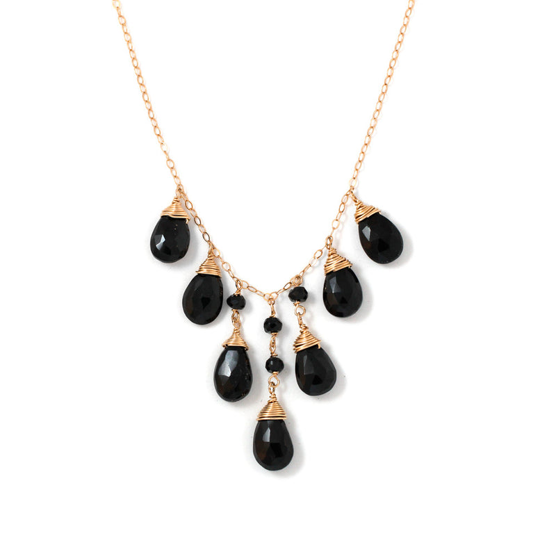 black spinel and gold necklace by delia langan jewelry