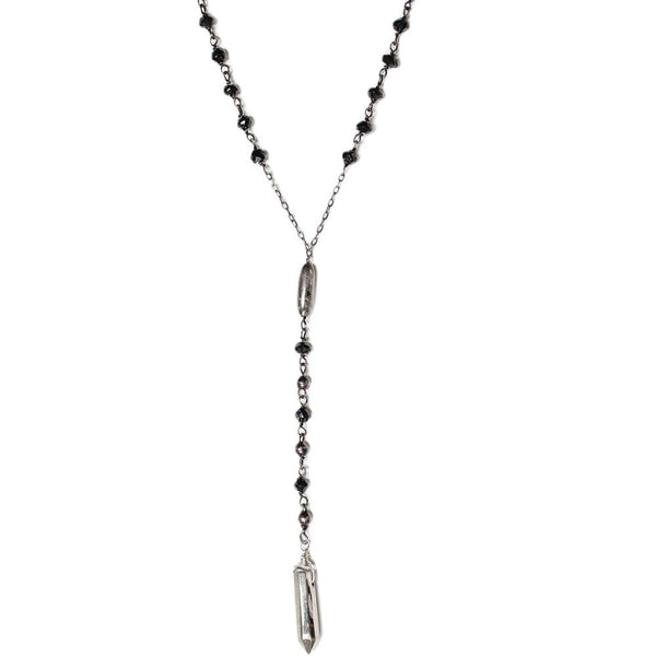 oxidized sterling silver long y black spinel gemstone necklace on a white surface