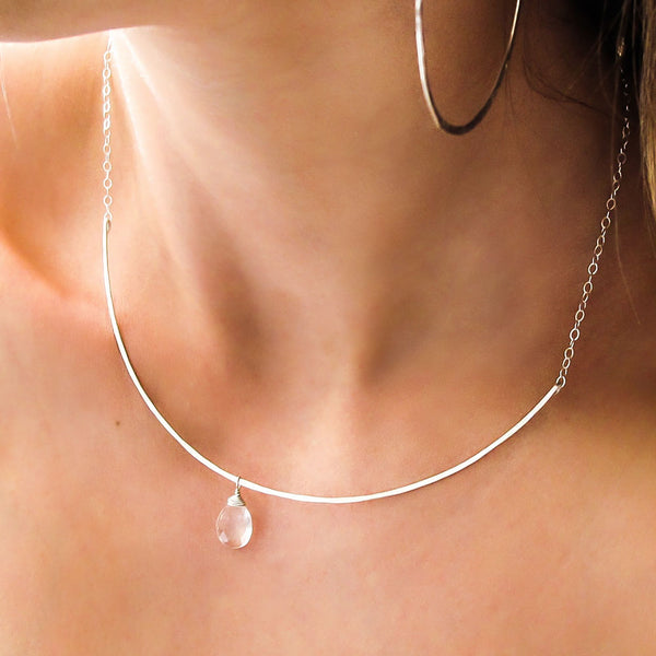 silver crystal quartz arc necklace by delia langan jewelry