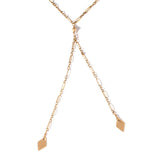 gold y shaped lariat necklace with diamond shaped pendants