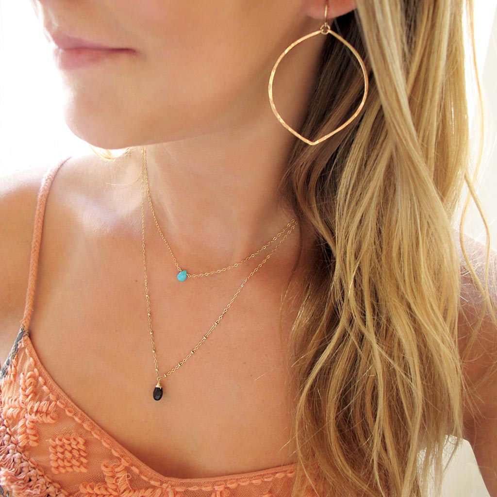 delicate gold turquoise and black spinel jewelry