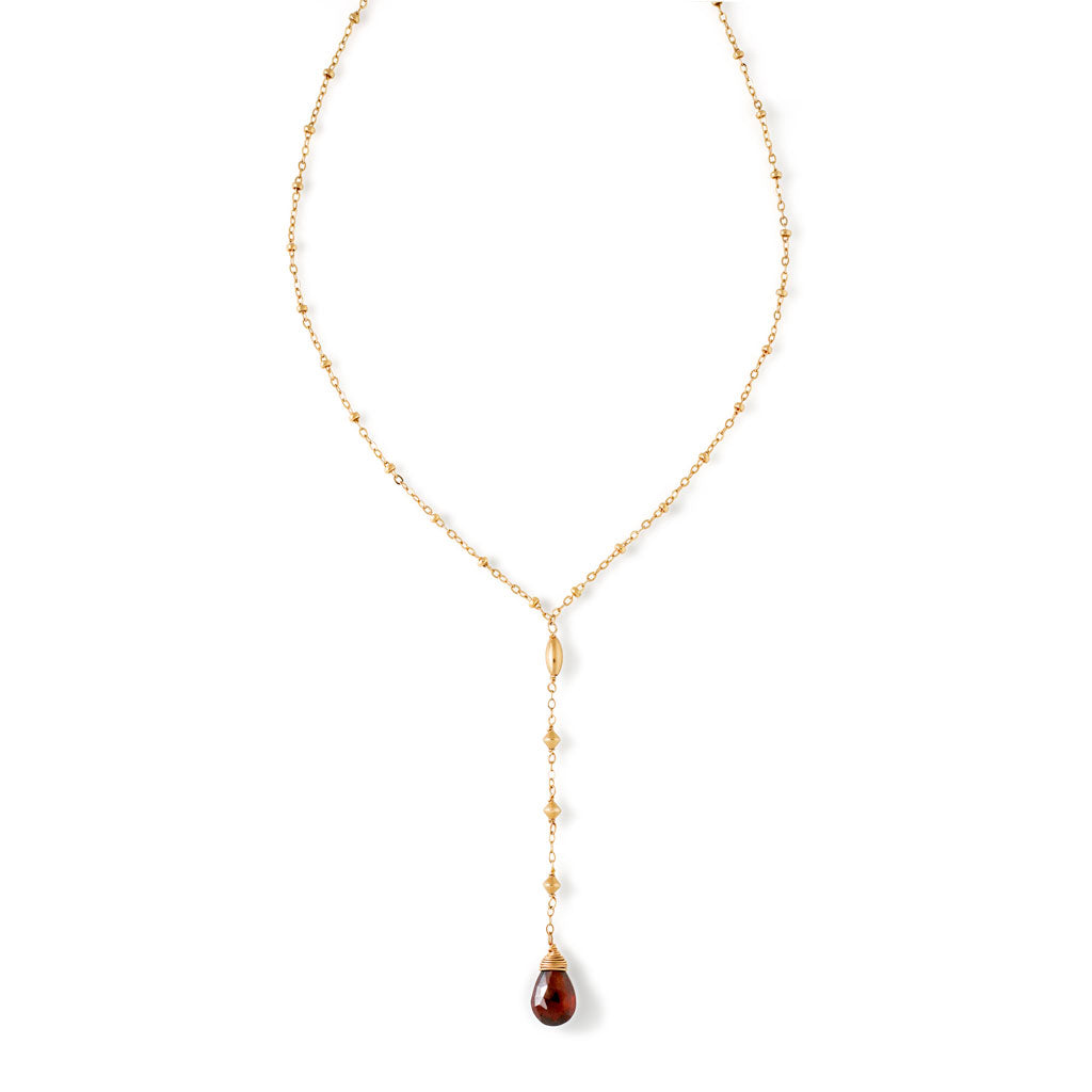 garnet y gemstone 14k gold filled necklace on white background