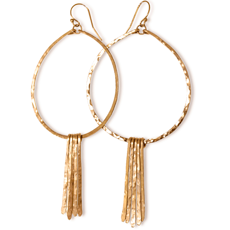 14k gold filled xl round fringe hoops on a white surface reflecting light
