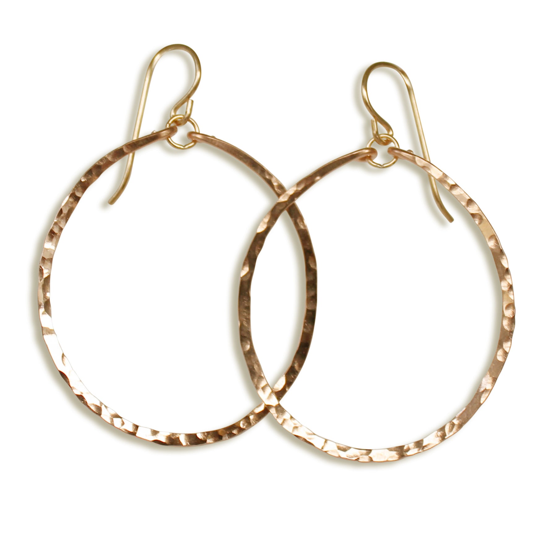 medium sized round hammered gold hoop earrings by delia langan jewelry