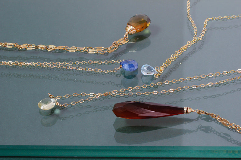 colorful kyanite lemon quartz beer quartz and hessonite gemstone necklaces with gold chain by delia langan jewelry in brooklyn ny