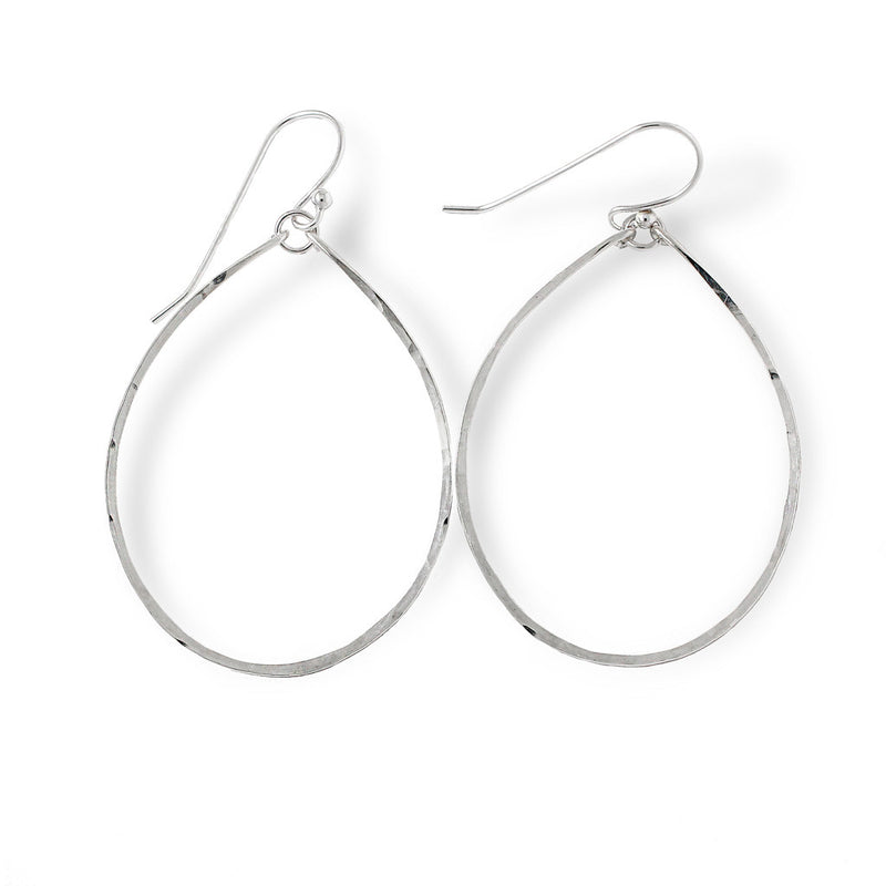 sterling silver hoops for nuns hoop earrings on a white surface