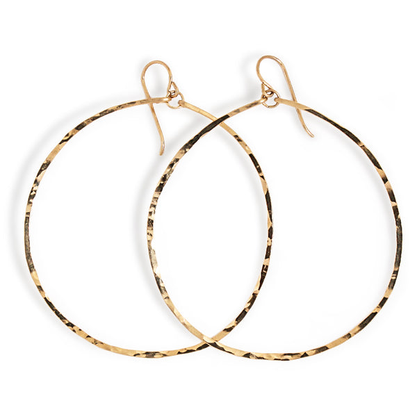 gold extra large round hammered hoop earrings handmade jewelry in williamsburg brooklyn by delia langan jewelry