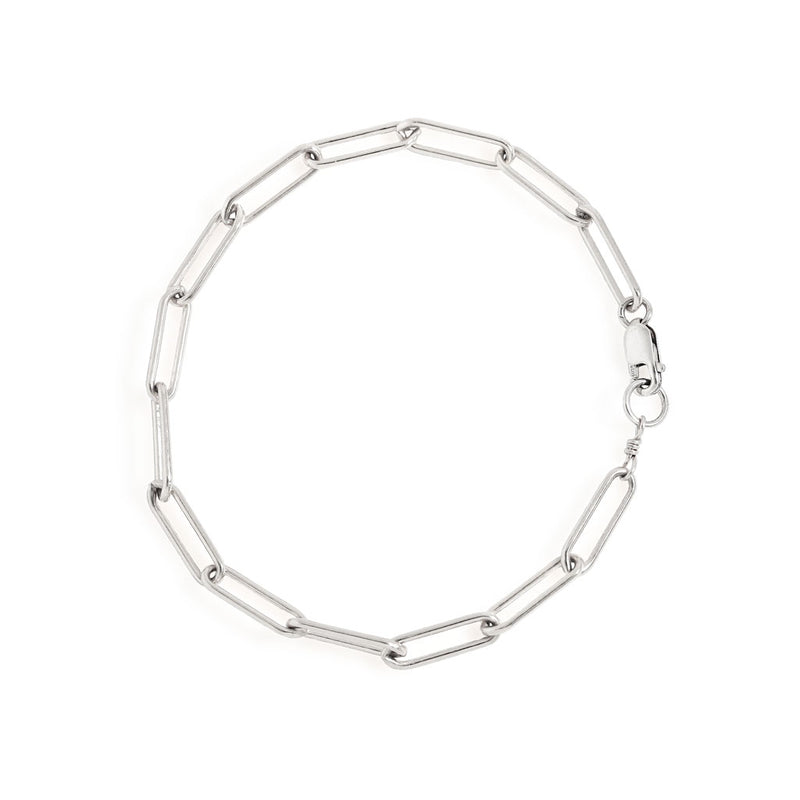 sterling silver large link chain bracelet on white surface