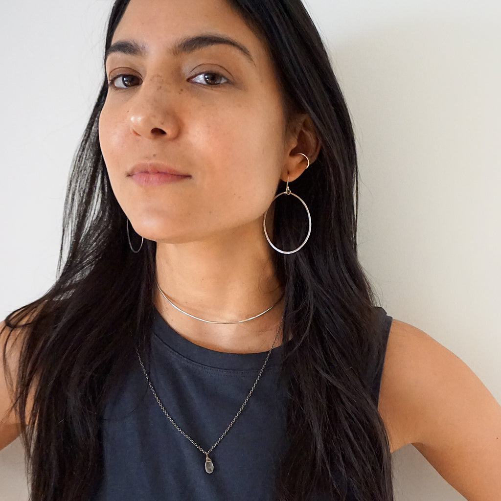 silver hoop earrings and silver cartilage hoop