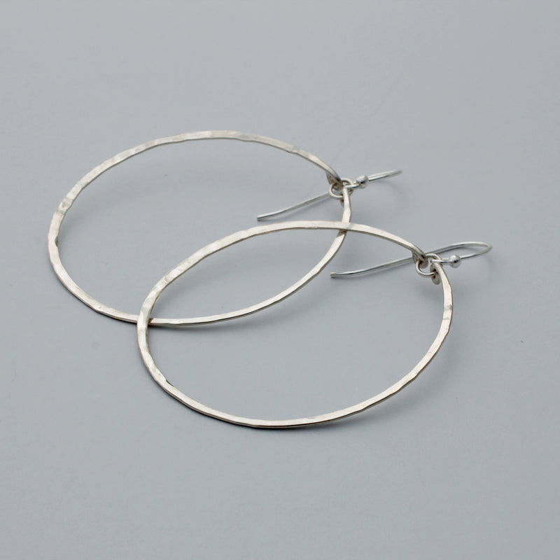 large round sterling silver hoop earrings by delia langan jewelry