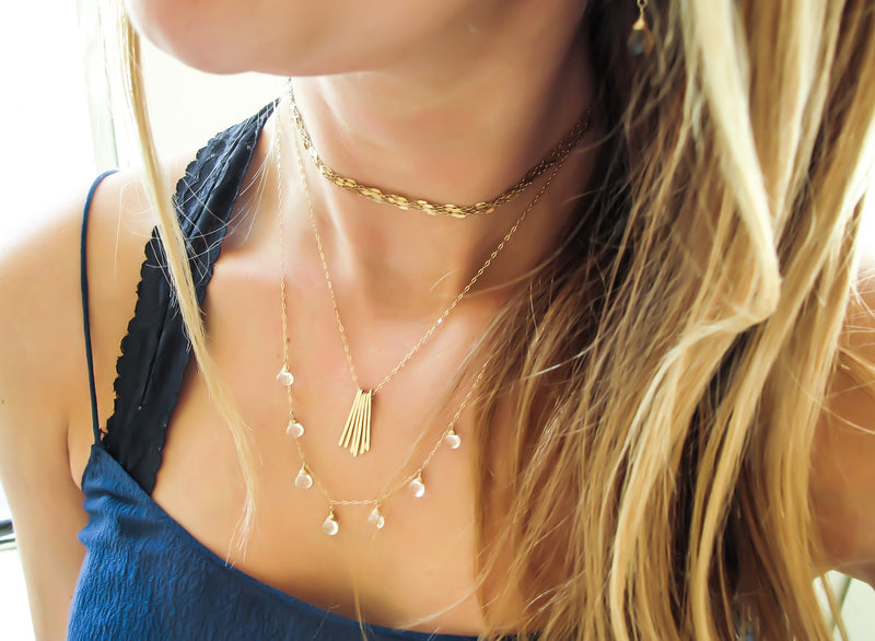 white topaz and 14k gold filled necklace by delia langan jewelry