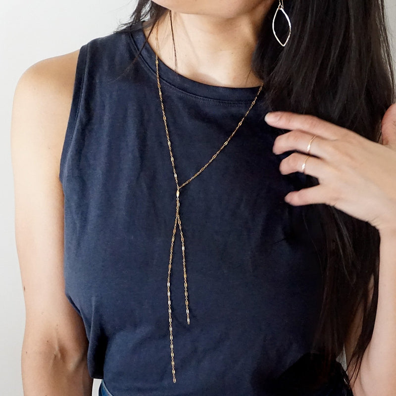 delicate long gold sequin y layering necklace by delia langan jewelry