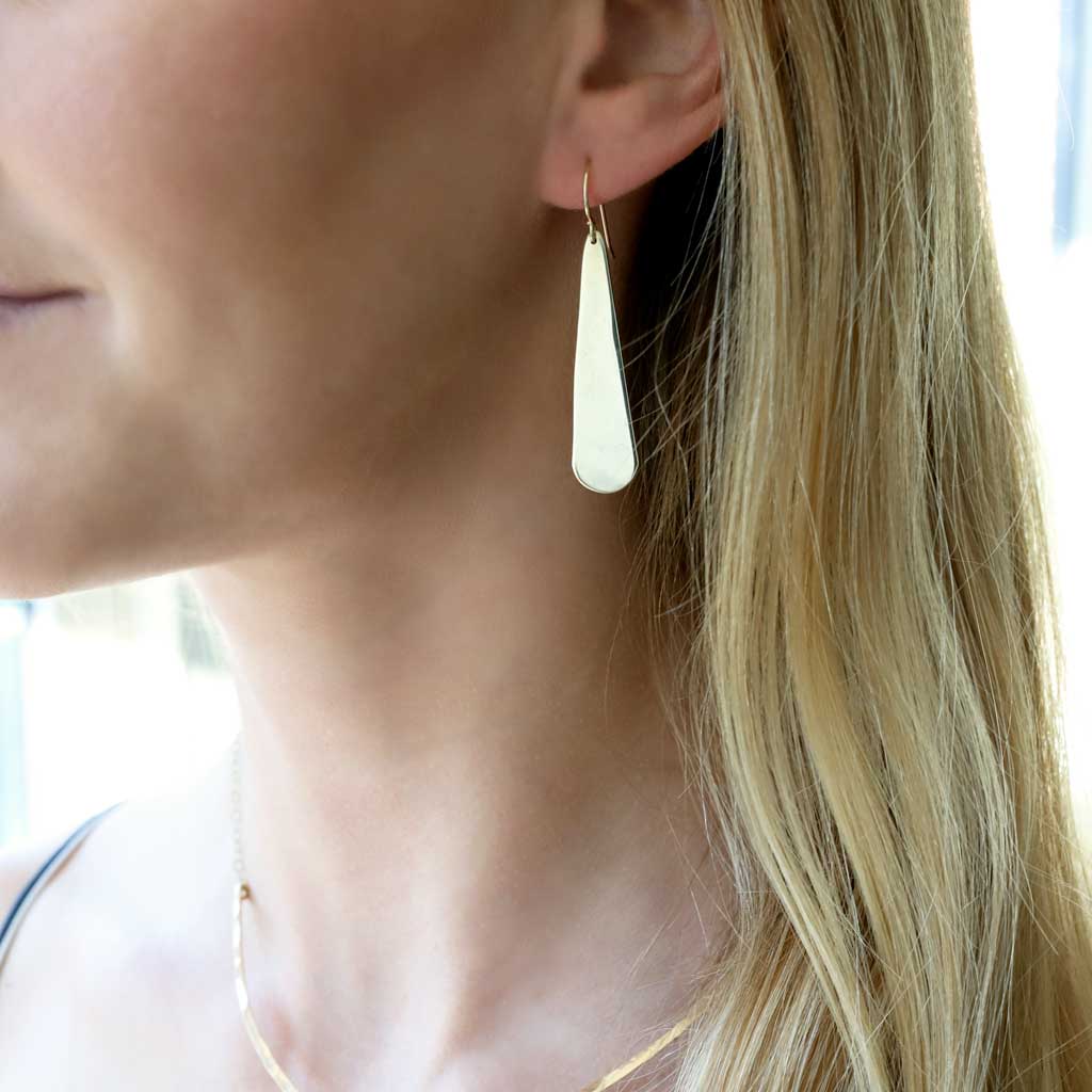 long flat teardrop earrings in gold by delia langan