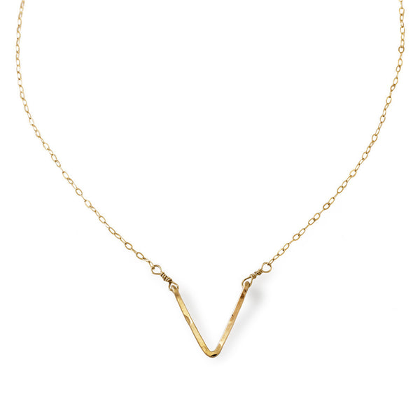 delicate gold v shaped pendant necklace by delia langan jewelry
